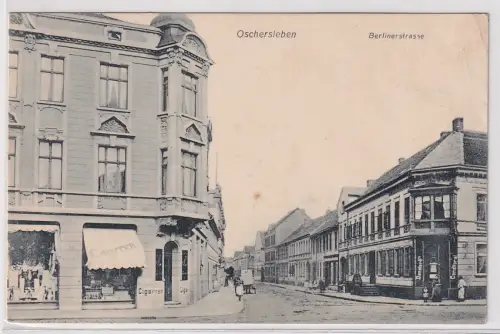 902049 Ak Oschersleben Berlinerstraße mit Tabakgeschäft 1910
