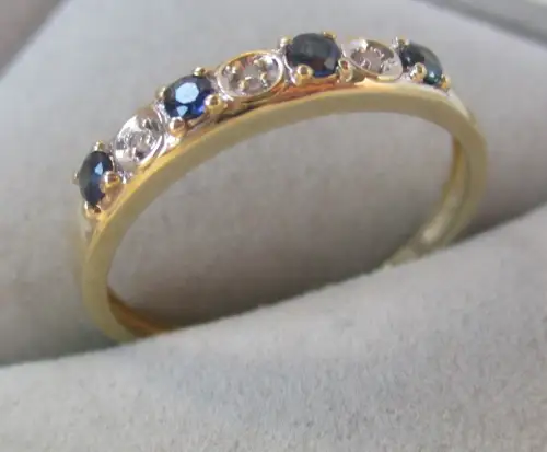 hochwertiger 333er Gold Ring mit blauen Topas + Diamanten (161360)