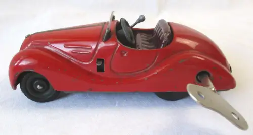 Blechspielzeug Schuco Auto 4001  Exmico rot mit Schlüsselaufzug (154044)