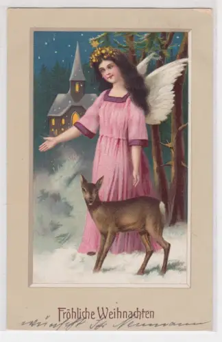 36692 AK Fröhliche Weihnachten - Engel mit Rehkitz vor winterlicher Kirche 1913