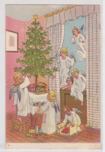 46708 Künstler AK Engel dekorieren Weihnachtsbaum mit Geschenken 1934