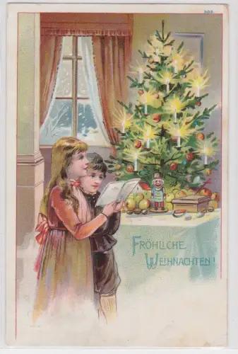 16830 Künstler AK Fröhliche Weihnachten! Kinder singen vor Weihnachtsbaum