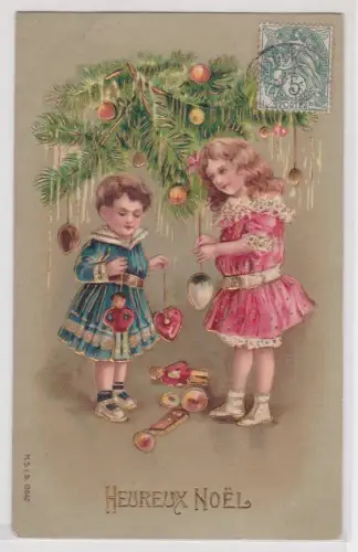 906721 Künstler AK Heureux Noël - Kinder schmücken Weihnachtsbaum mit Kugeln
