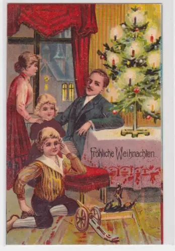 54972 Künstler AK Fröhliche Weihnachten, Familie sitzt am Weihnachtsbaum 1912