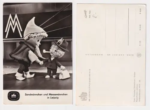 67334 Ak DDR Fernsehen: Sandmännchen und Messemännchen in Leipzig 1965