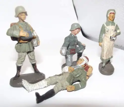 Elastolin Lazarett Krankenschwester versorgt verletzen Soldat 4 Figuren WK2