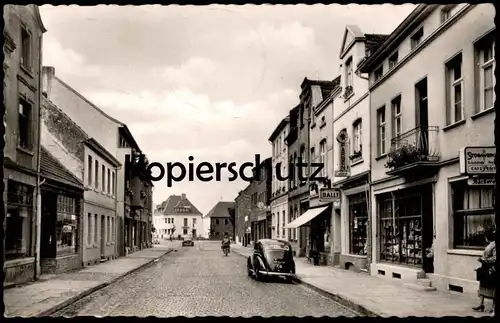 ALTE POSTKARTE MECKENHEIM RHEINLAND TEIL DER HAUPTSTRASSE STOLLWERCK SCHOKOLADE DALLI CAFÉ BÄCKEREI PETERS chocolate AK