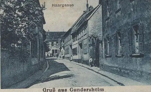 ALTE POSTKARTE GRUSS AUS GUNDERSHEIM HAARGASSE KAUFHAUS VON JAKOB MUNDORFF HAUPTSTRASSE Pferde horses postcard Wonnegau