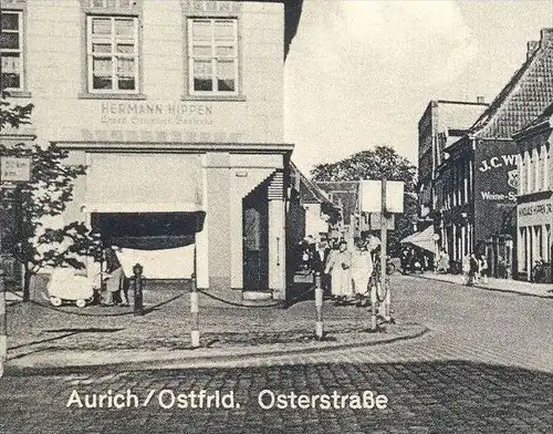 ÄLTERE POSTKARTE AURICH OSTFRIESLAND OSTERSTRASSE HERMANN HIPPEN UHREN BESTECK BOCKSTIEGEL SCHUHHAUS AUTO-GARAGEN cpa AK