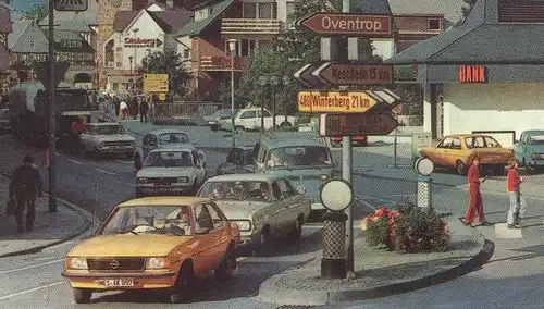 ÄLTERE POSTKARTE OLSBERG BAHNHOFSTRASSE SAUERLAND OPEL VOLKSWAGEN FAHRRAD Schild Öventrop Meschede Auto Autos Car Cars