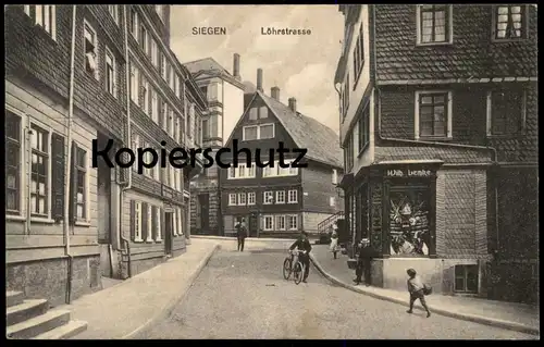 ALTE POSTKARTE SIEGEN LÖHRSTRASSE WILHELM LEMKE DECO KUNSTWAREN SPIELWAREN KINDER RAD PUPPE doll poupée bike bicycle AK