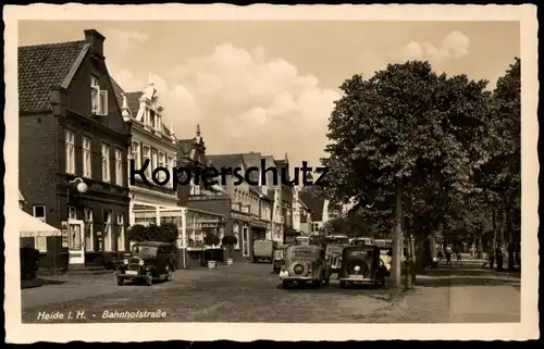 ALTE POSTKARTE HEIDE IN HOLSTEIN BAHNHOFSTRASSE ASTRA ST. PAULI BIER JACOB SCH.. HOTEL Ansichtskarte cpa postcard AK