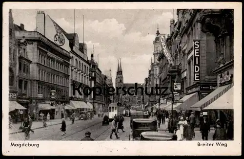 ALTE POSTKARTE MAGDEBURG BREITER WEG SEIDE AUSVERKAUF STRASSENBAHN TRAM Werbung Orion tramway Ansichtskarte postcard