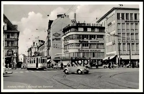 ALTE POSTKARTE KREFELD OSTWALL AM BAHNHOF VW KÄFER STRASSENBAHN 4711 DREIRING SEIFEN LOHMANN SCHOKOLADE AK cpa postcard