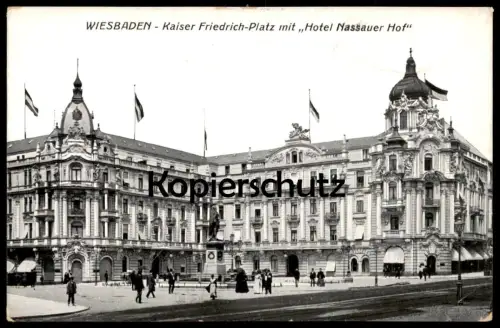 ALTE POSTKARTE WIESBADEN KAISER-FRIEDRICH-PLATZ MIT HOTEL NASSAUER HOF Flaggen Ansichtskarte cpa postcard AK