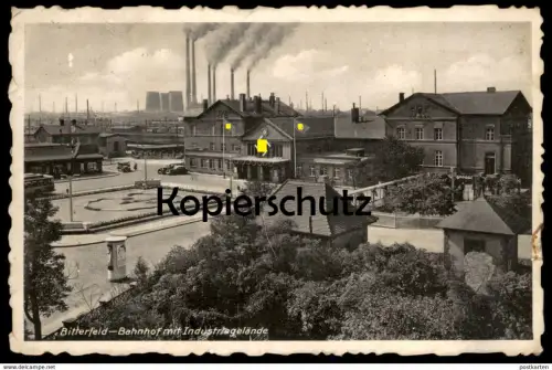 ALTE POSTKARTE BITTERFELD BAHNHOF MIT INDUSTRIEGELÄNDE 1939 Beflaggung Symbol station gare Industrie industry postcard