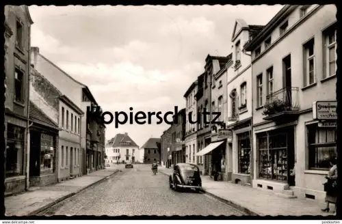 ALTE POSTKARTE MECKENHEIM RHEINLAND TEIL DER HAUPTSTRASSE STOLLWERCK SCHOKOLADE DALLI CAFÉ BÄCKEREI PETERS chocolate AK