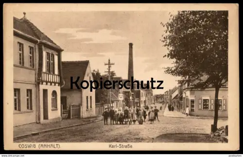 ALTE POSTKARTE COSWIG ANHALT KARL-STRASSE KINDER MÄDCHEN JUNGEN Sachsen-Anhalt cpa postcard AK Ansichtskarte