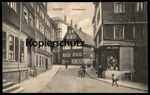 ALTE POSTKARTE SIEGEN LÖHRSTRASSE WILHELM LEMKE DECO KUNSTWAREN SPIELWAREN KINDER RAD PUPPE doll poupée bike bicycle AK