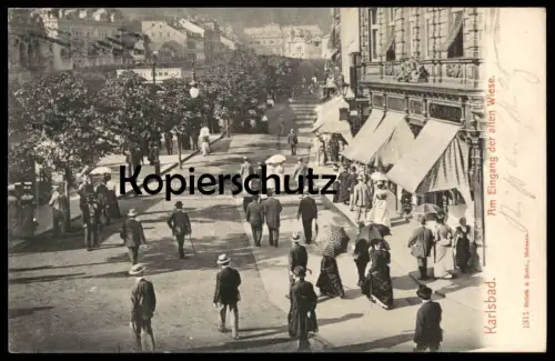 ALTE POSTKARTE KARLSBAD AM EINGANG DER ALTEN WIESE Karlovy Vary Ceska Republika Personen Hut hat chapeau umbrella cpa AK