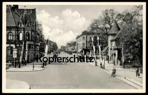 ALTE POSTKARTE NEURUPPIN FRIEDRICH-WILHELM-STRASSE UND RHEINSBERGER TOR STADTGARTEN Eisenbahn Brandenburg Ansichtskarte