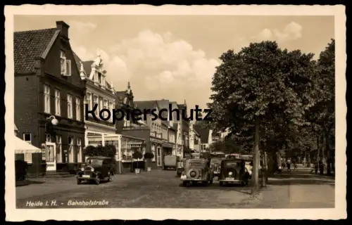 ALTE POSTKARTE HEIDE IN HOLSTEIN BAHNHOFSTRASSE ASTRA ST. PAULI BIER JACOB SCH.. HOTEL Ansichtskarte cpa postcard AK