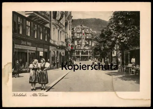 ALTE POSTKARTE KARLSBAD ALTE WIESE 1944 TRACHT BEFLAGGUNG JOSEF ... Karlovy Vary Ceska Republika Personen cpa AK