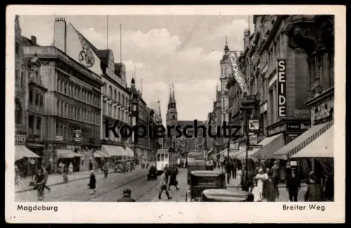 ALTE POSTKARTE MAGDEBURG BREITER WEG SEIDE AUSVERKAUF STRASSENBAHN TRAM Werbung Orion tramway Ansichtskarte postcard