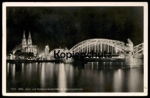 ALTE POSTKARTE KÖLN DOM HOHENZOLLERNBRÜCKE IM SCHEINWERFERLICHT BEI NACHT RHEINGOLD-SERIE Nr. 1013 Ansichtskarte cpa AK