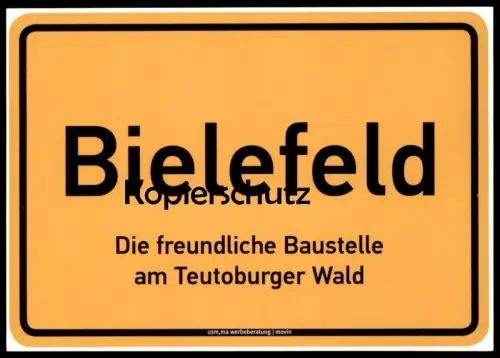 POSTKARTE BIELEFELD DIE FREUNDLICHE BAUSTELLE AM TEUTOBURGER WALD ORTSEINGANGSSCHILD HUMOR