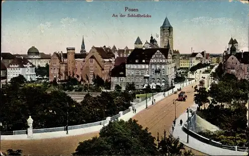 Ak Poznań Posen, An der Schlossbrücke, Straßenpartie mit Turm, Straßenbahn