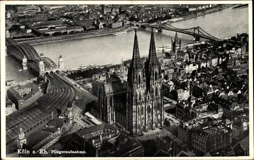 Ak Köln am Rhein, Teilansicht der Stadt mit Kölner Dom und Rheinbrücken, Fliegeraufnahme