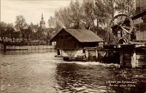 Ak Lübben im Spreewald, Partie an der alten Mühle, Wassermühle, Kirche