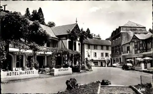 Ak Capvern Les Bains Hautes Pyrénées, Le centre de la Ville, Straßenpartie, Hotel de la Poste