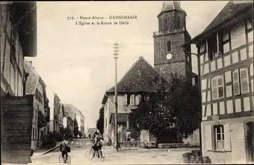 Ak Dannemarie Dammerkirch Elsass Haut Rhin, L'Église et la Route de Delle