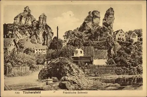 Ak Tüchersfeld Pottenstein im Kreis Bayreuth Oberfranken, Teilansicht vom Ort, Felsen