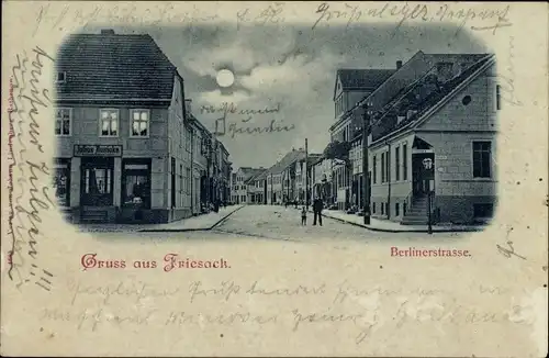 Mondschein Ak Friesack im Havelland, Berliner Straße, Schneidermeister Julius Rusicke, Apotheke