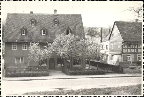 Foto Deutschland, Straßenszene in einem Ort, Gebäude, Geschäft