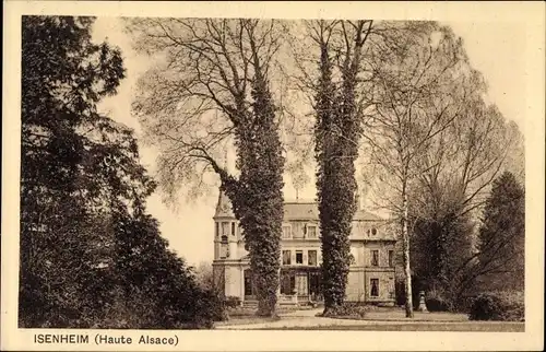 Ak Issenheim Isenheim Elsass Haut Rhin, Straßenpartie mit Blick auf ein Gebäude