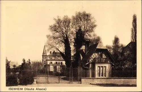 Ak Issenheim Isenheim Elsass Haut Rhin, Straßenpartie mit Blick auf ein Haus