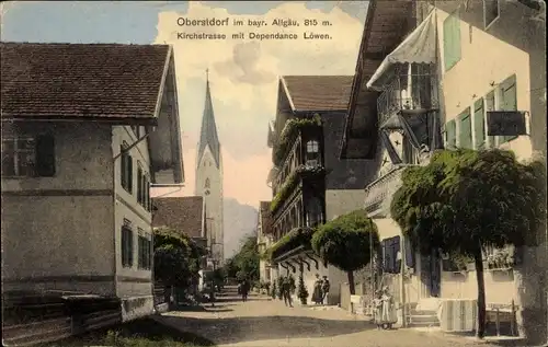 Ak Oberstdorf im Oberallgäu, Kirchstraße mit Blick zur Kirche, Dependance Löwen, Gasthaus, Anwohner