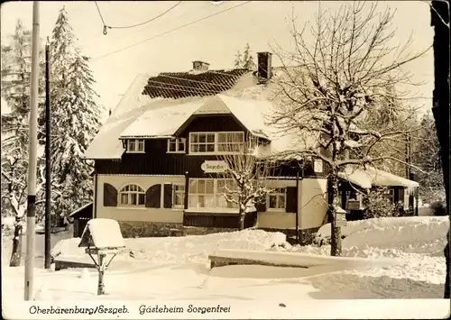 Ak Bärenburg Altenberg im Erzgebirge, Blick auf das verschneite Gästeheim Sorgenfrei, Vogelhäuschen