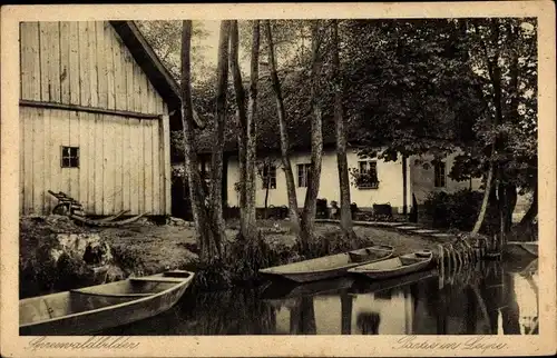 Ak Leipe Lübbenau im Spreewald, Blick vom Fluss auf zwei Häuser, Boote