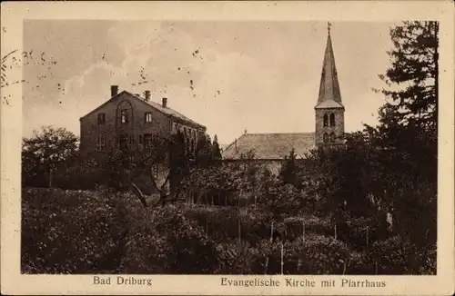 Ak Bad Driburg im Kreis Höxter, Evangelische Kirche mit Pfarrhaus