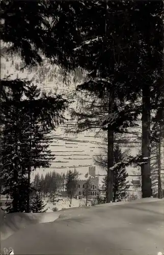 Ak Ponte di Legno Lombardia, La Stagione, Blick auf die Ortschaft im Winter