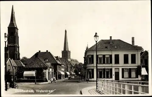 Ak Doetinchem Gelderland, Waterstraat, Stadtansicht, Glockenturm, Straßenpartie