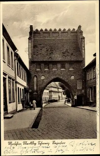 Ak Malchin in Mecklenburg Vorpommern, Steintor, Straßenpartie