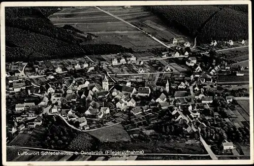 Ak Schledehausen Bissendorf in Niedersachsen, Fliegeraufnahme, Glockenturm