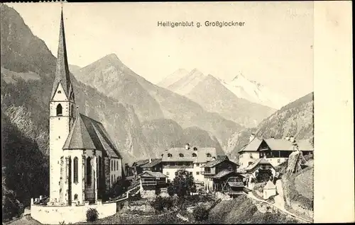 Ak Heiligenblut am Großglockner in Kärnten, Kirche, Panoramaansicht von Ortschaft 