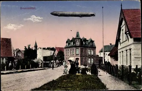 Ak Brunsbüttel in Dithmarschen, Zeppelin über der Stadt, Straßenpartie
